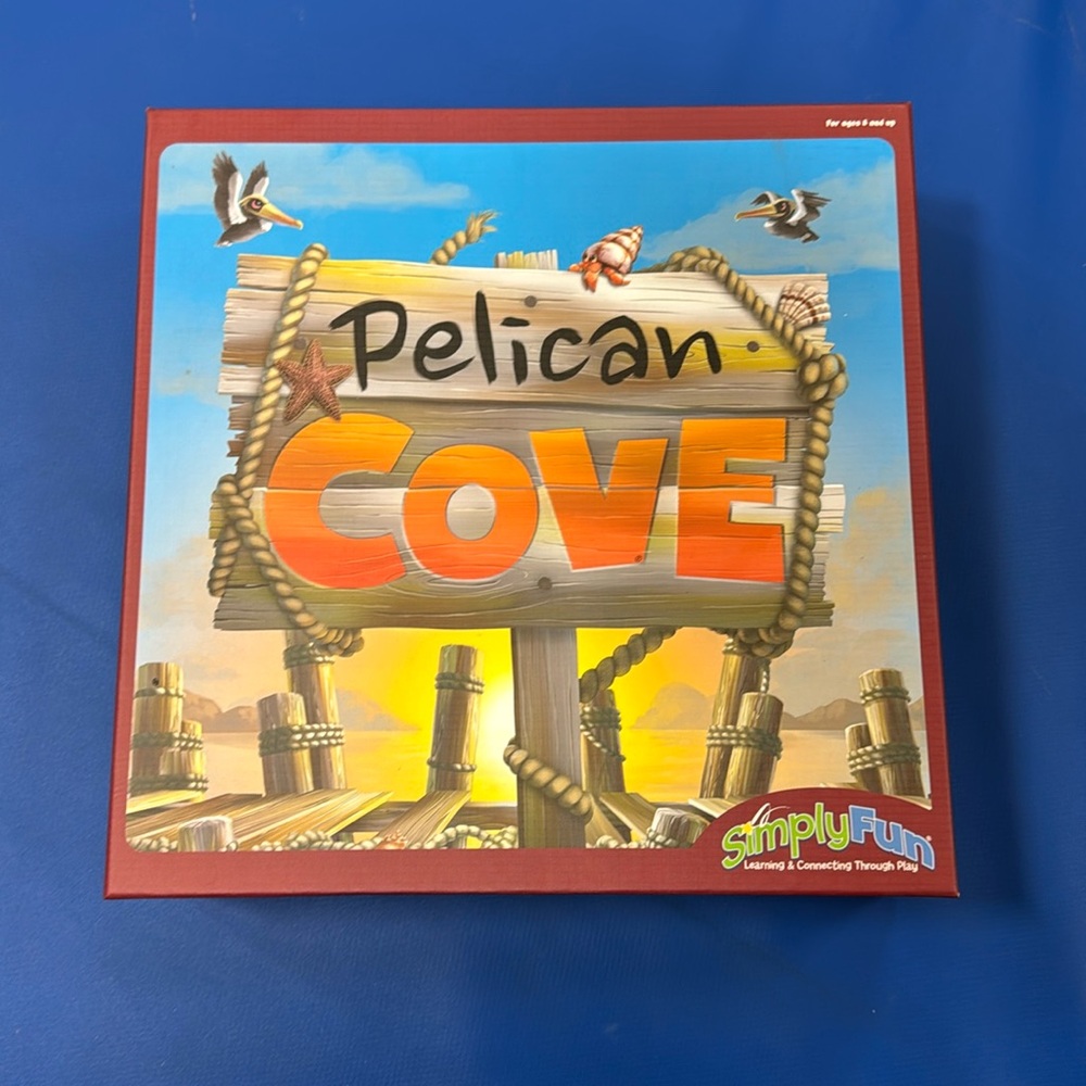 Pelican Cover Board Game with components